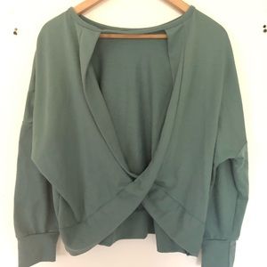 Green sweater with back cut out size large